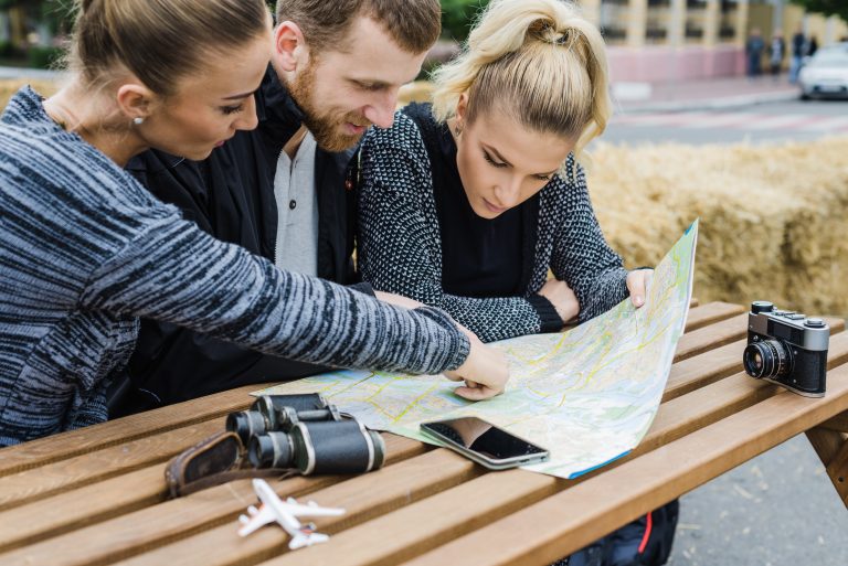 friends sitting choosing destination